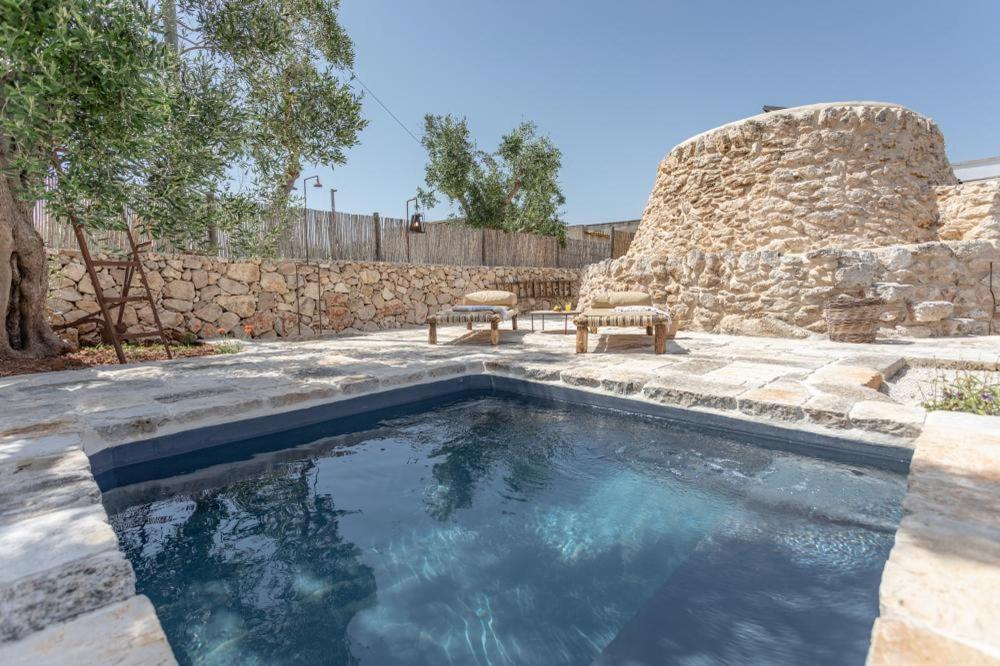 Trullo Santovia Bed & Breakfast ซันตีซิโดโร ภายนอก รูปภาพ